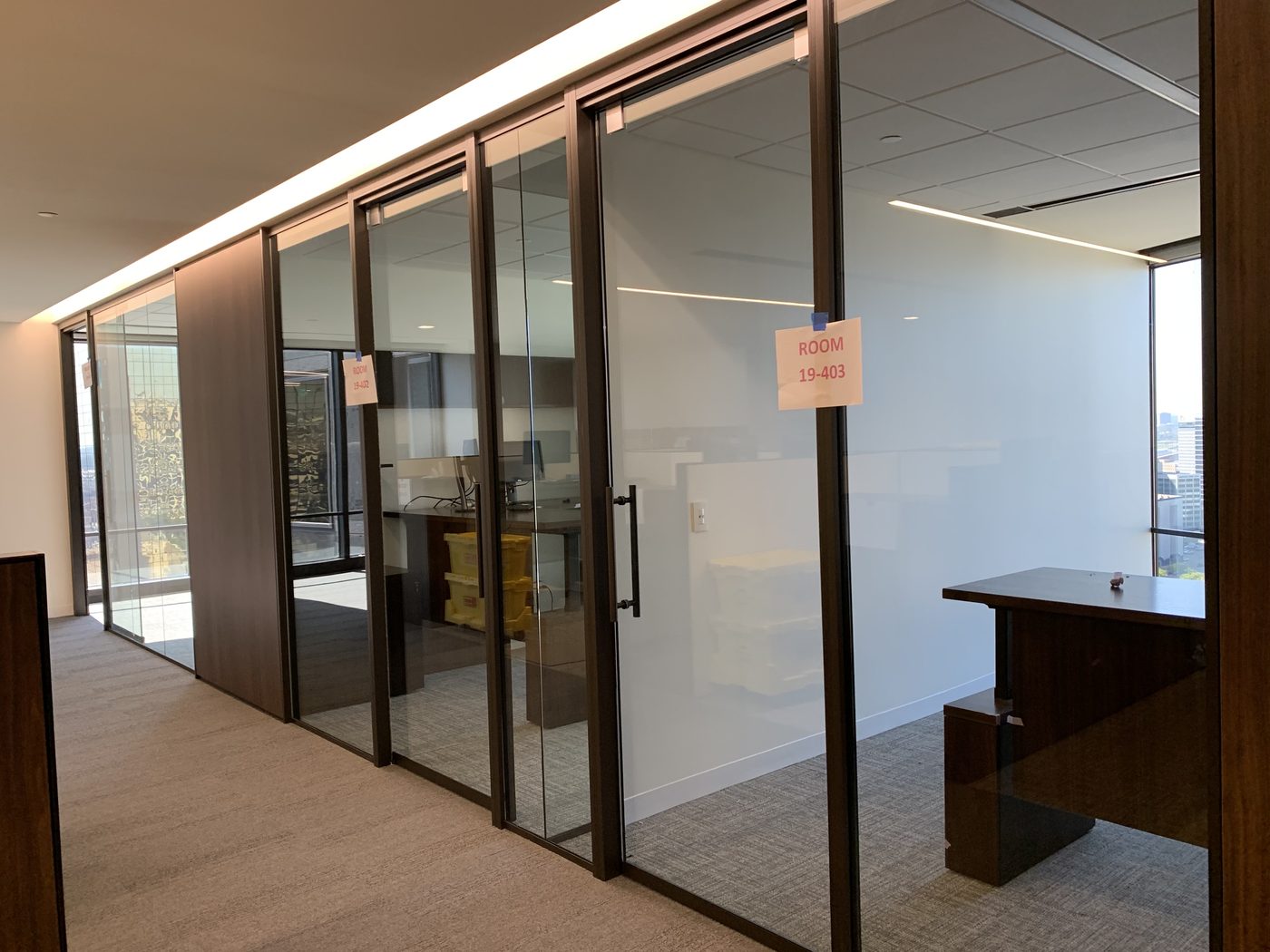 Wood and glass office corridor