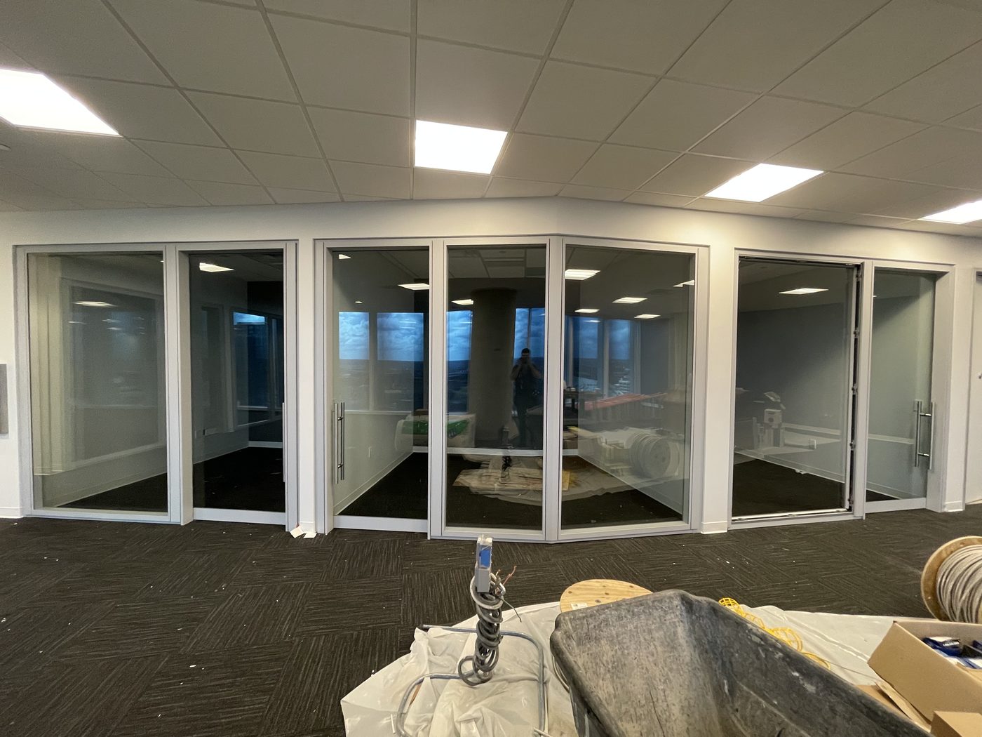 Glass office bays in a finished lobby