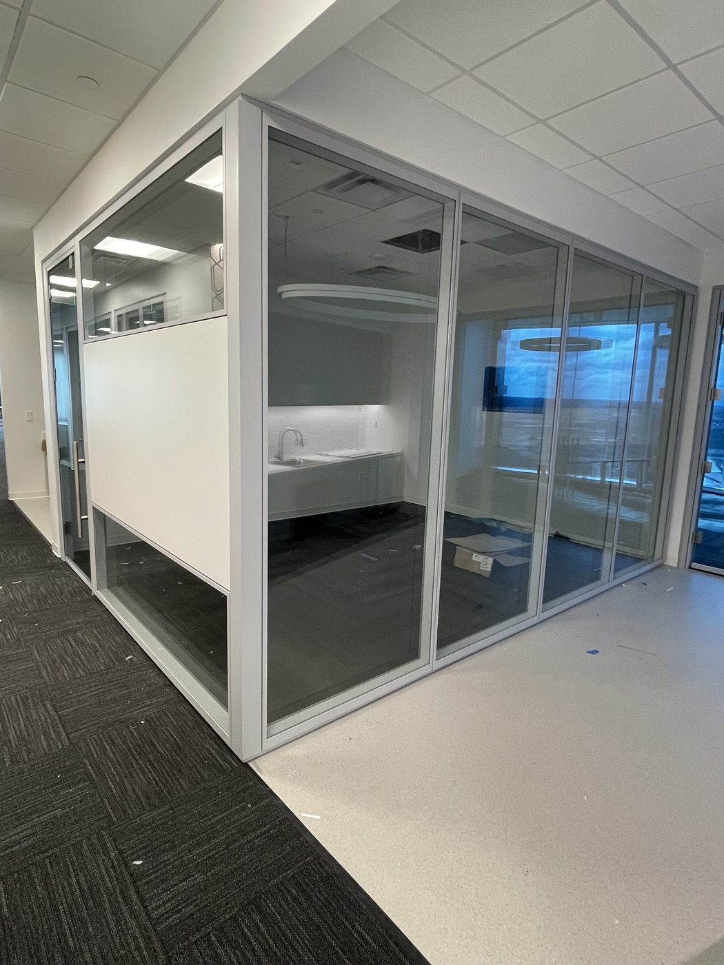Glass-enclosed kitchen and break area
